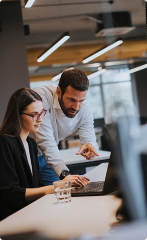 Professionals collaborating in office